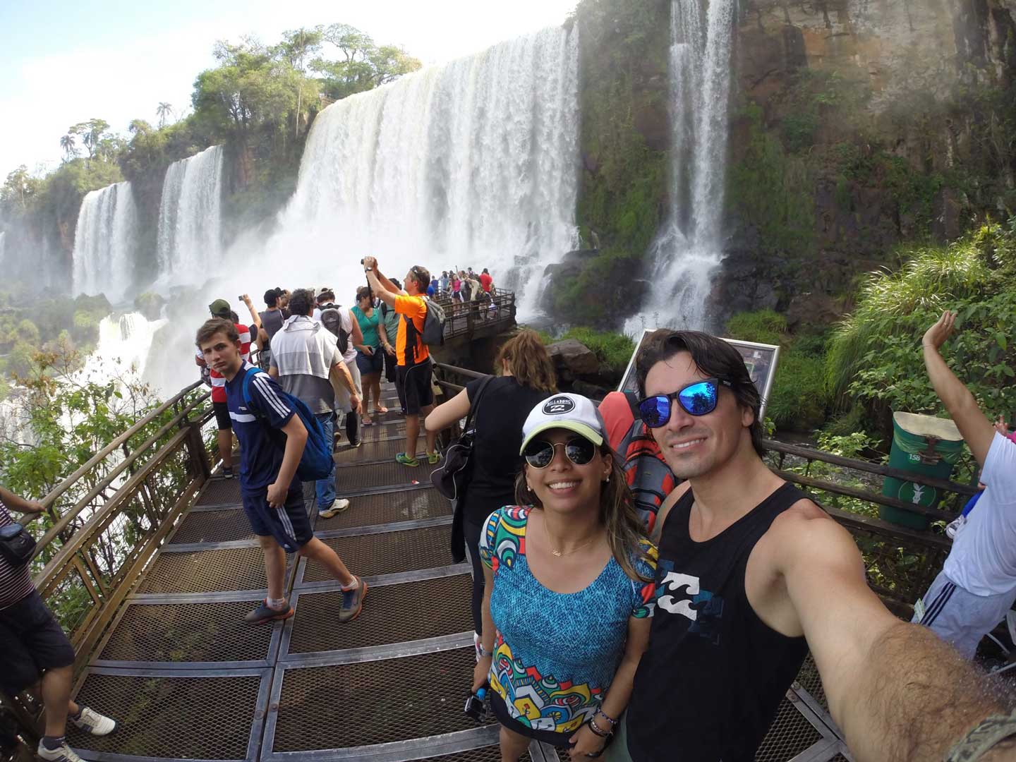 Tourists taking selfie at Iguazu Falls