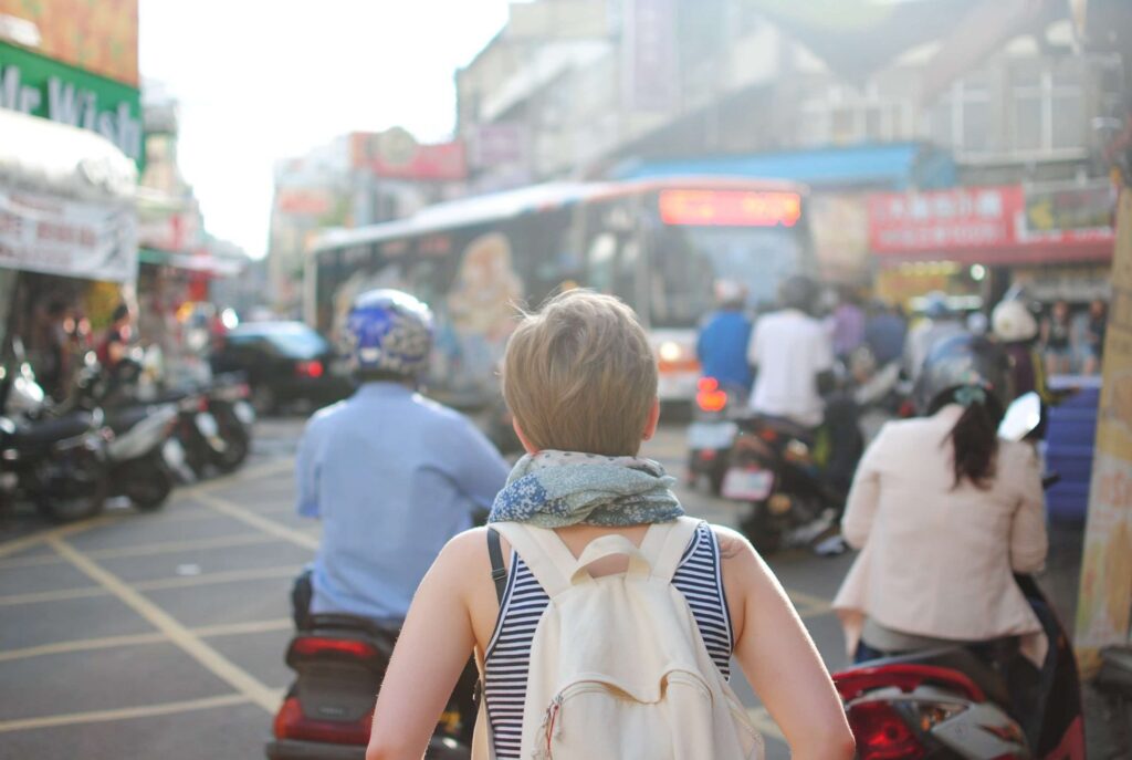 woman traveling alone on a cheap trip